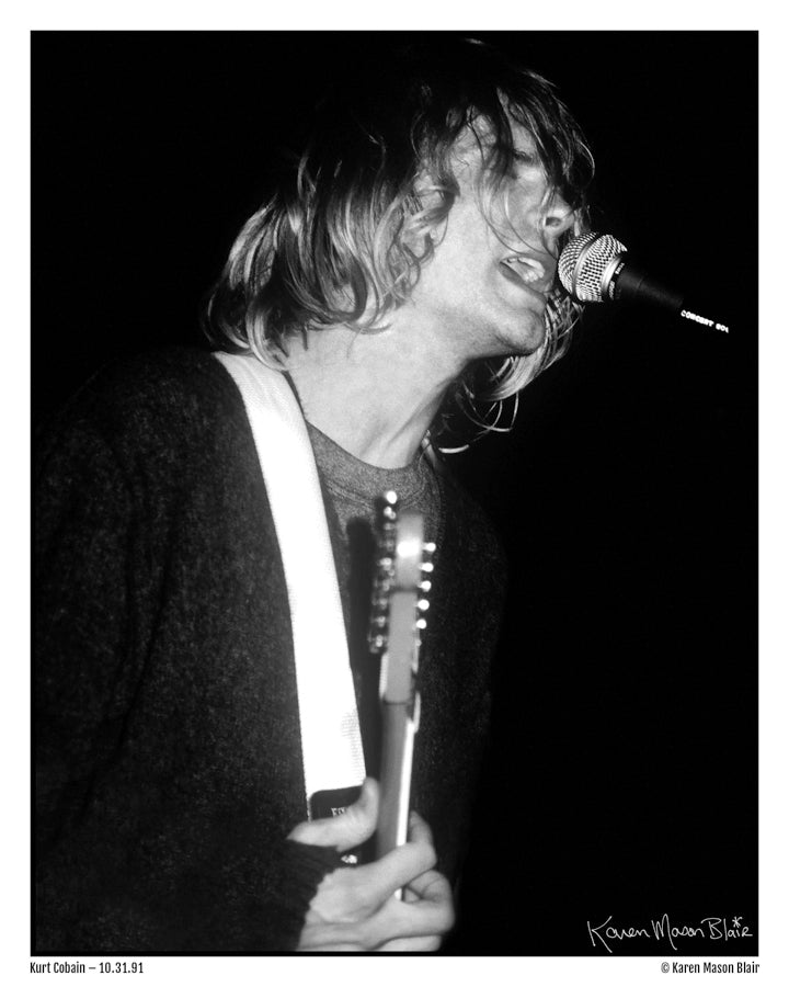 Black and white 8x10 photo of Kurt Cobain from Seattle photographer Karen Mason Blair's Grunge Mart. Captures Kurt performing at Live at the Paramount, perfect for Nirvana fans, grunge music fans, and collectors. Signed by the photographer. 