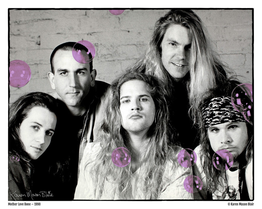 Mother Love Bone old school promo photo from 1990 from Seattle photographer Karen Mason Blair's Grunge Mart. Black-and-white photo of the band posing by a brick wall with pink bubbles, available as a signed 8x10 print. Signed by the photographer. 